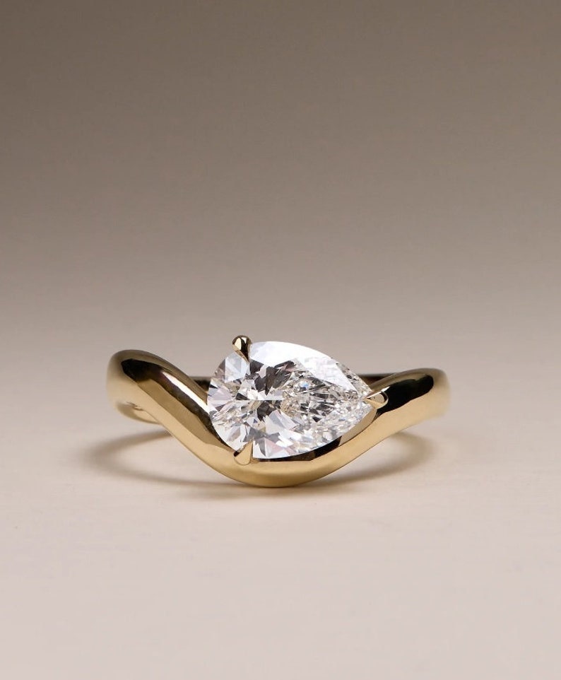 0.50 CT Pear Cut Solitaire Moissanite Engagement Ring 1